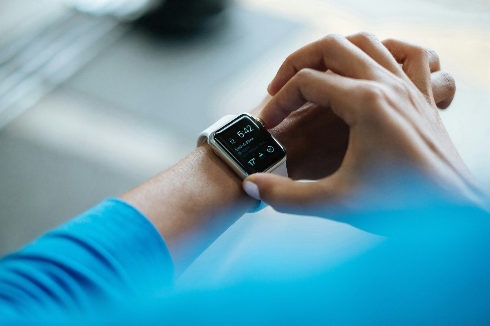 person clicking apple watch